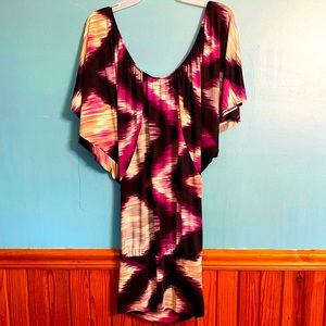 Dress with no tag, purple colors and size medium.